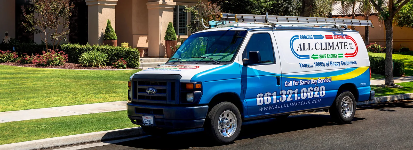 All Climate Air service van parked outside a house