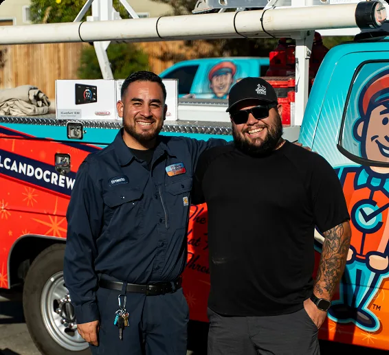 Two Can Do Crew team members in front of a company truck