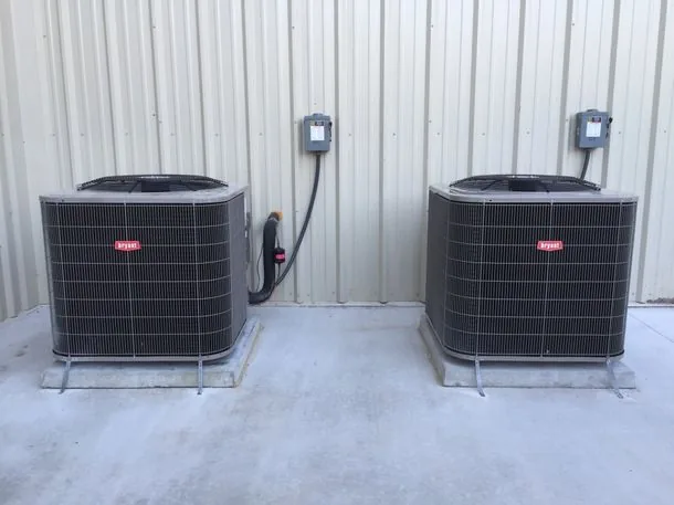 Two outdoor condenser units installed by Ben's Heating & Air