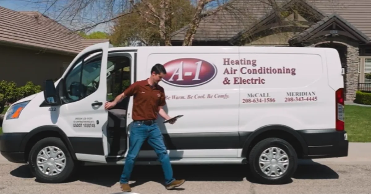 A-1 technician stepping out of a branded A-1 service van