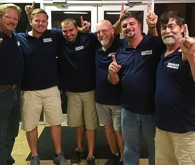 Gilman Cooling & Heating team in company shirts