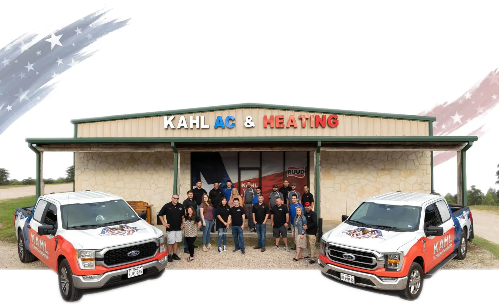 Kahl A/C & Heating team outside the Montgomery office with two company trucks