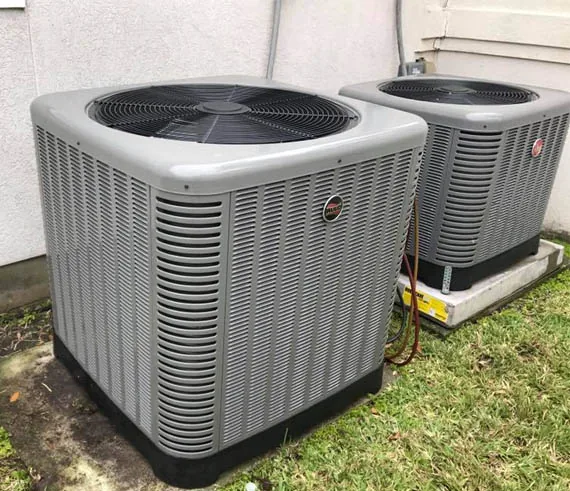 Two outdoor condenser units installed by Absolute Air Conditioning
