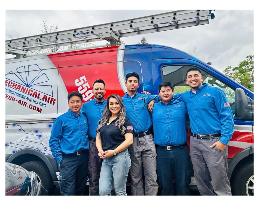 Mechanical Air team in front of a branded company van