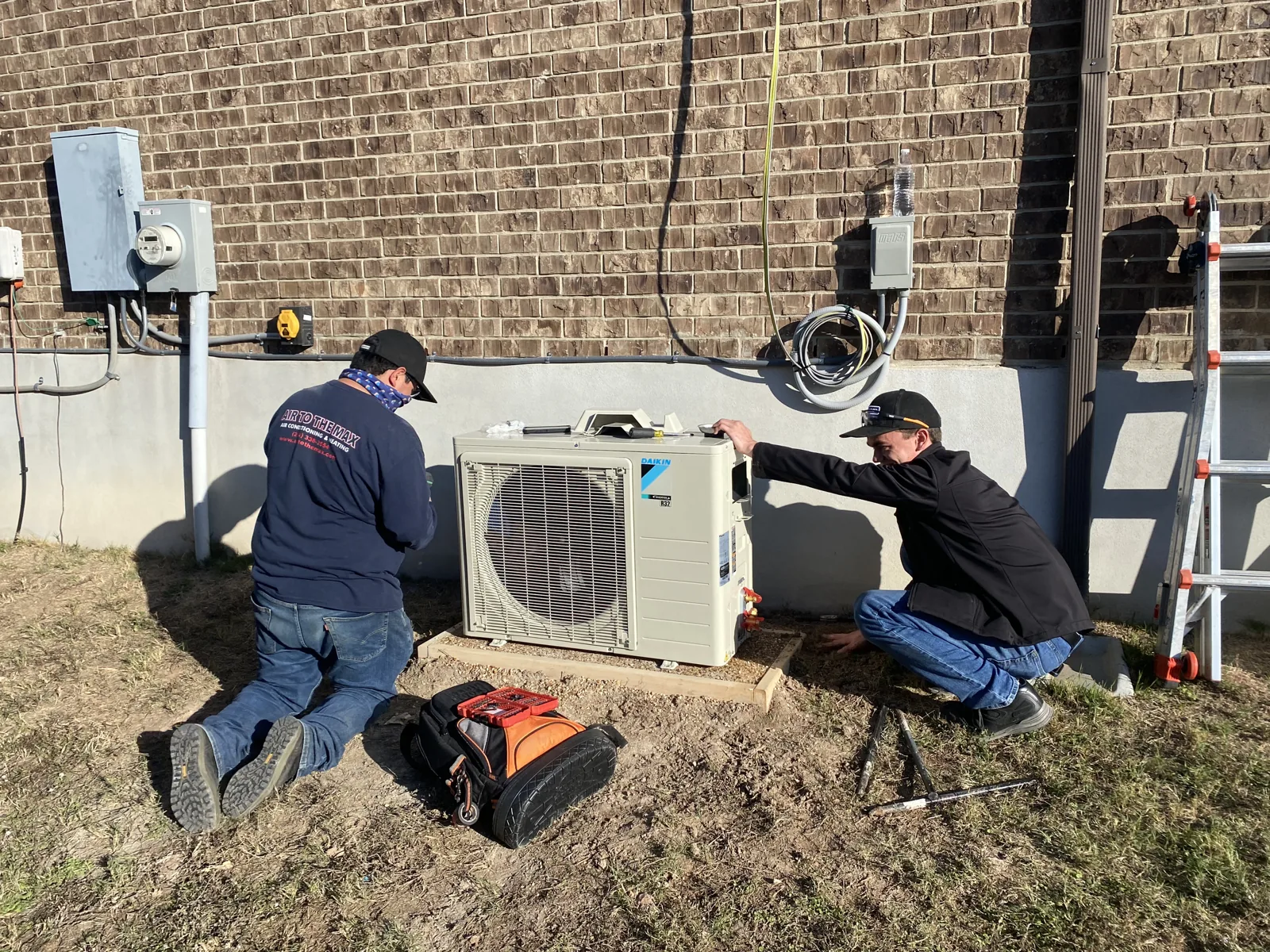 Air to the Max technicians installing a ductless mini-split