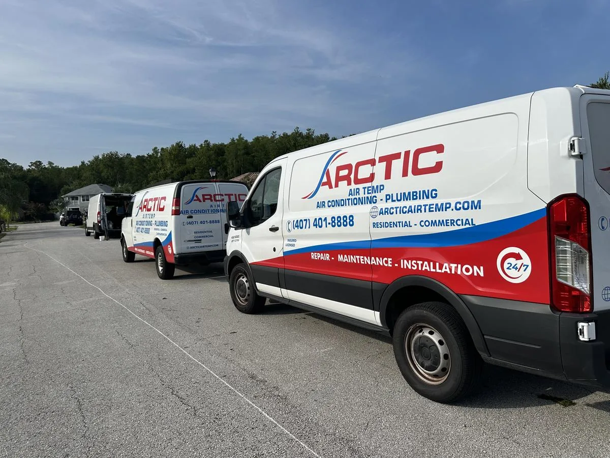 Arctic Air Temp service vans lined up on a street