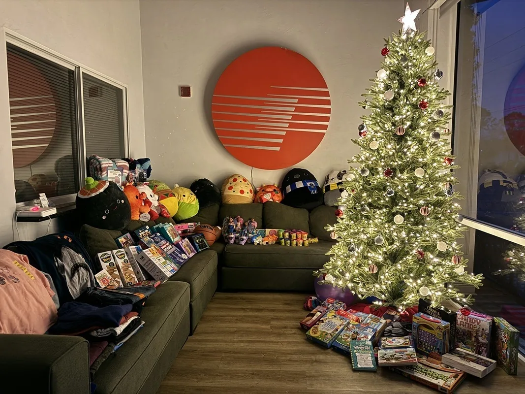 Pure Air office lobby with the company logo during a holiday toy drive