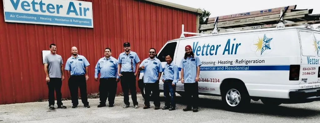 Vetter Air team in front of the shop and a company van