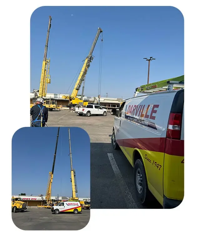 Darville van at a commercial job with cranes lifting rooftop equipment