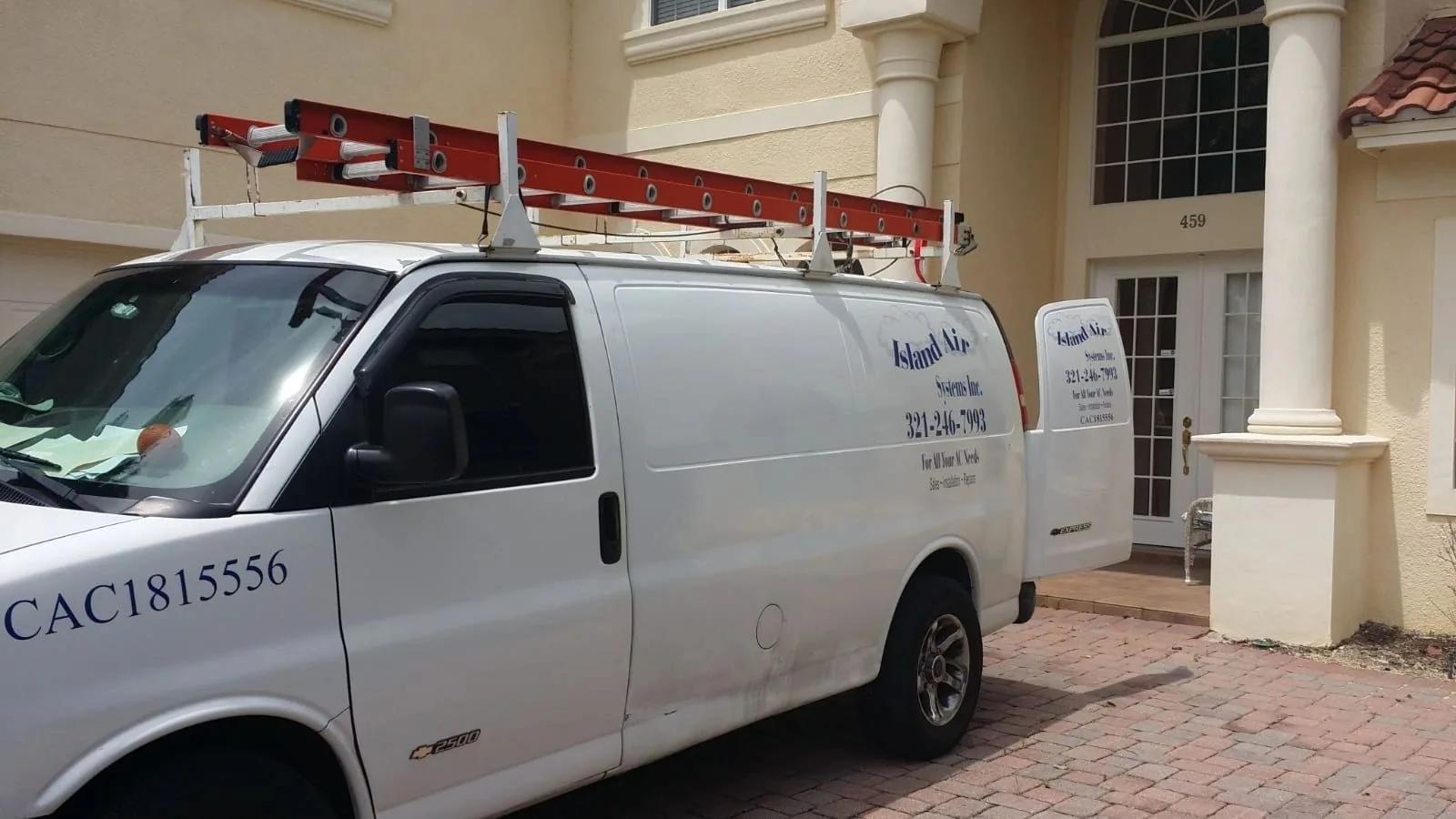 Island Air Systems work van with its license number on the side