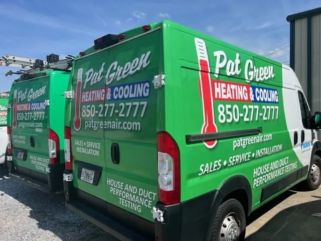 Pat Green Heating & Cooling service vans