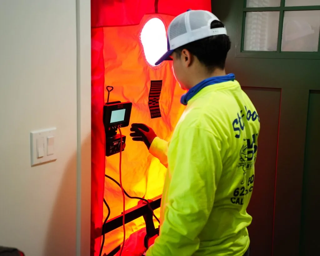 Way Cool technician testing a home during an energy audit