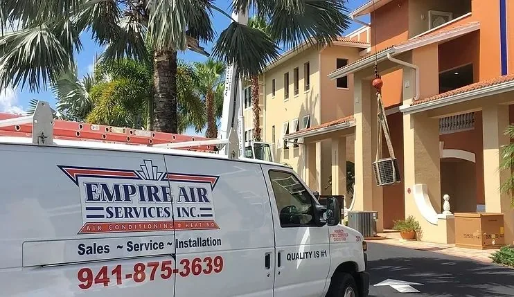 Empire Air Services van at a job site