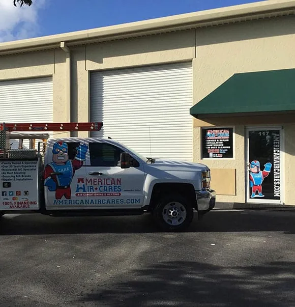American Air Cares service truck parked outside the company office