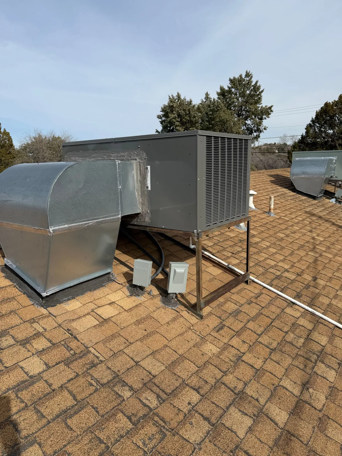 Rooftop HVAC unit and new ductwork installed by AC Medic