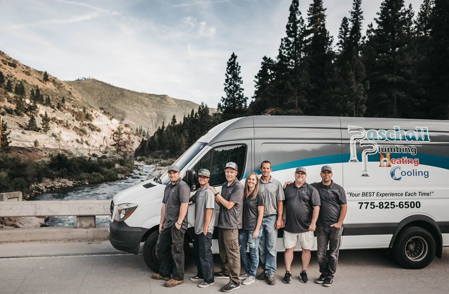 Paschall Plumbing Heating Cooling team in front of a company van