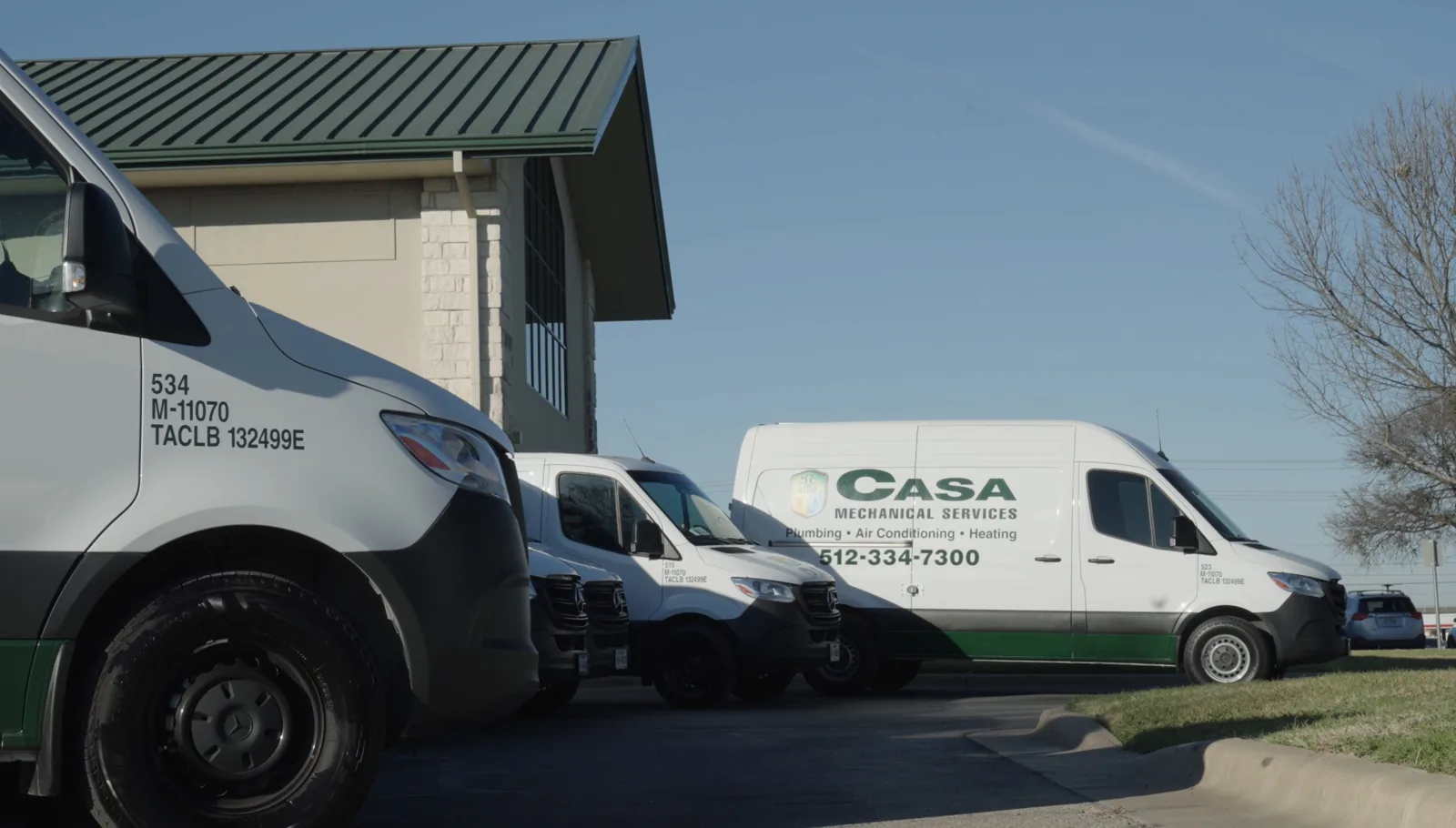 Casa Mechanical Services vans parked outside the Round Rock office