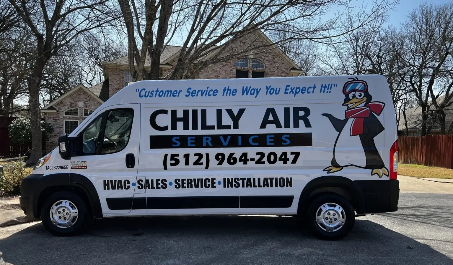 Chilly Air Services van with the company penguin logo