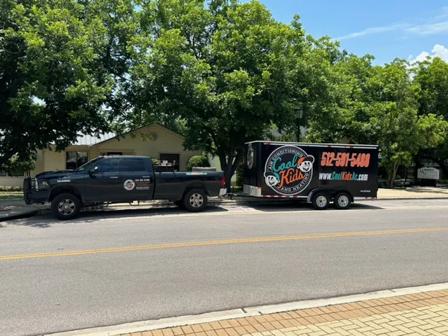 Cool Kids AC & Heat truck and branded trailer