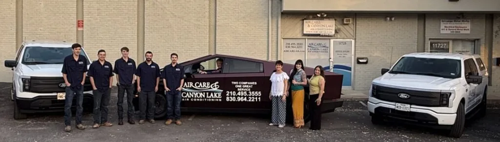 Air Care team in front of company trucks