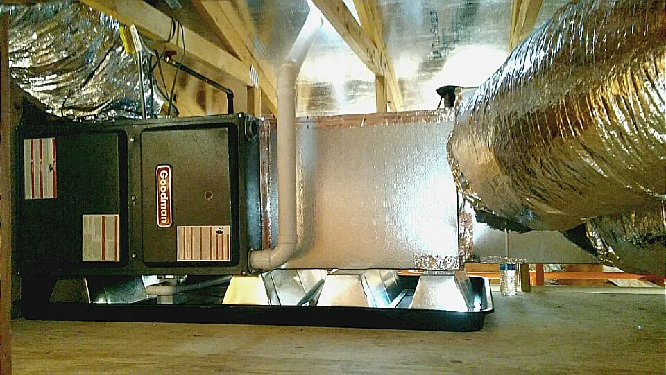 Split system furnace and ductwork installed by Coaches HVAC in an attic