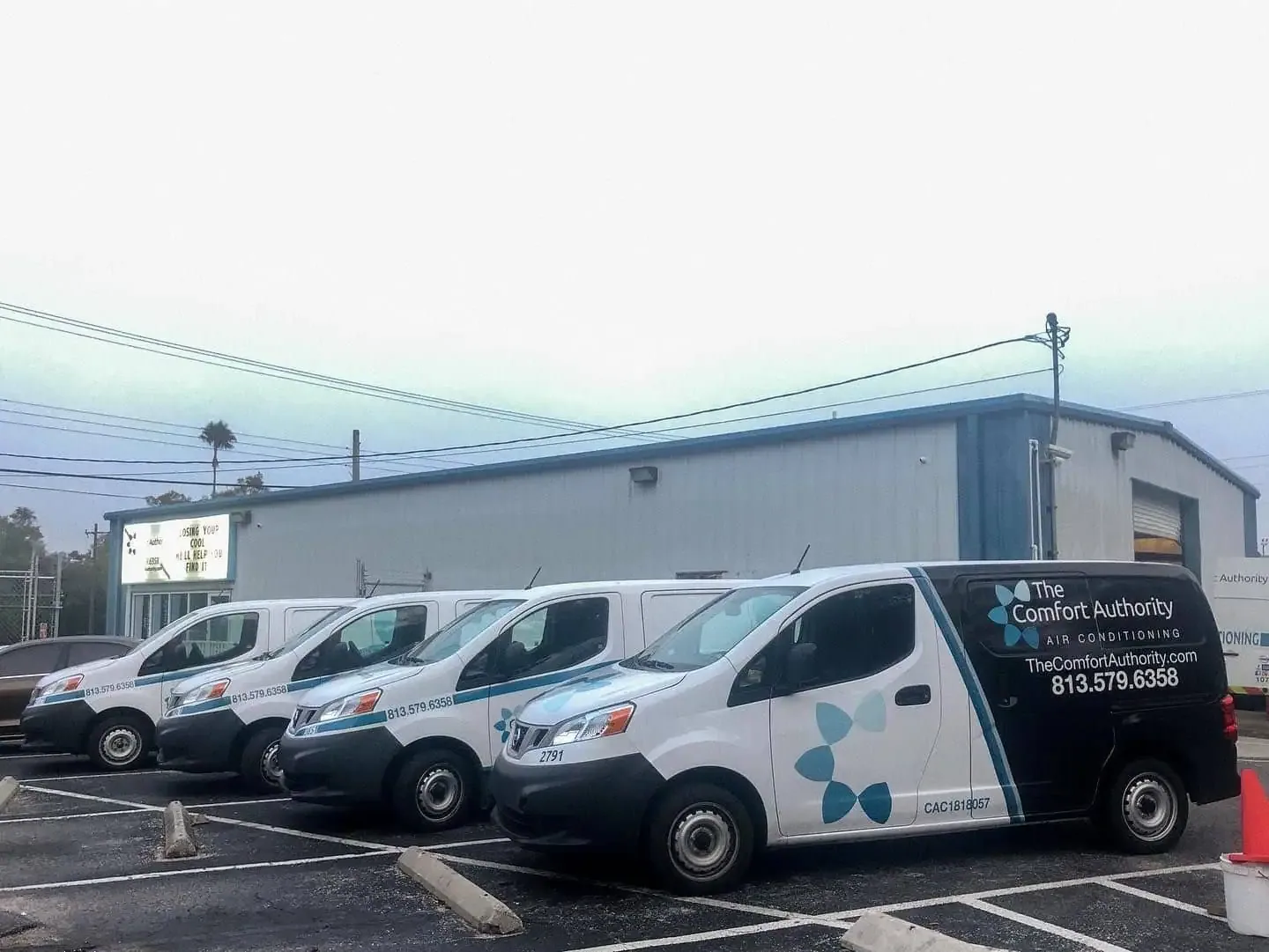 The Comfort Authority service vans parked outside the company building