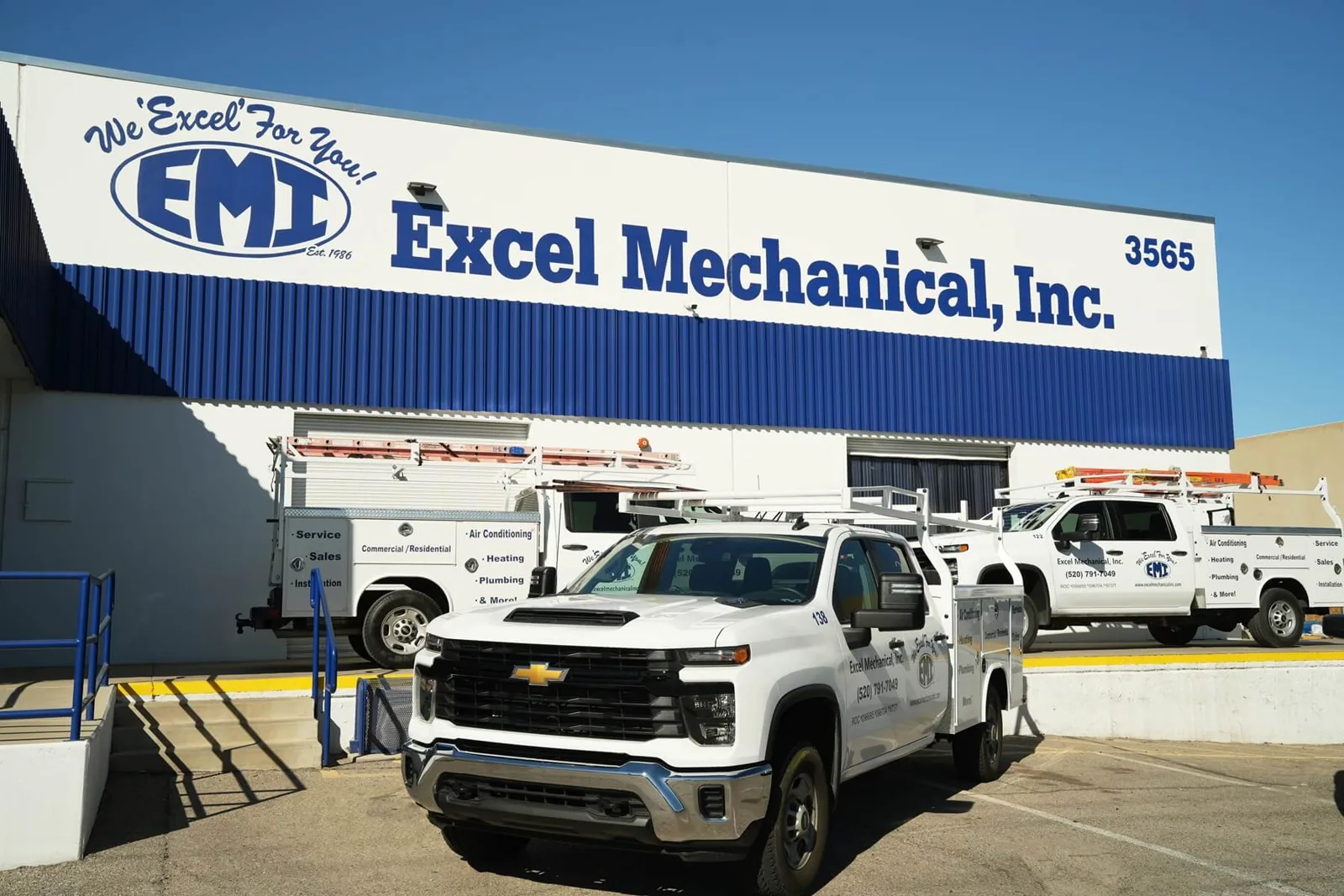 Excel Mechanical office on Golf Links Road with company service trucks