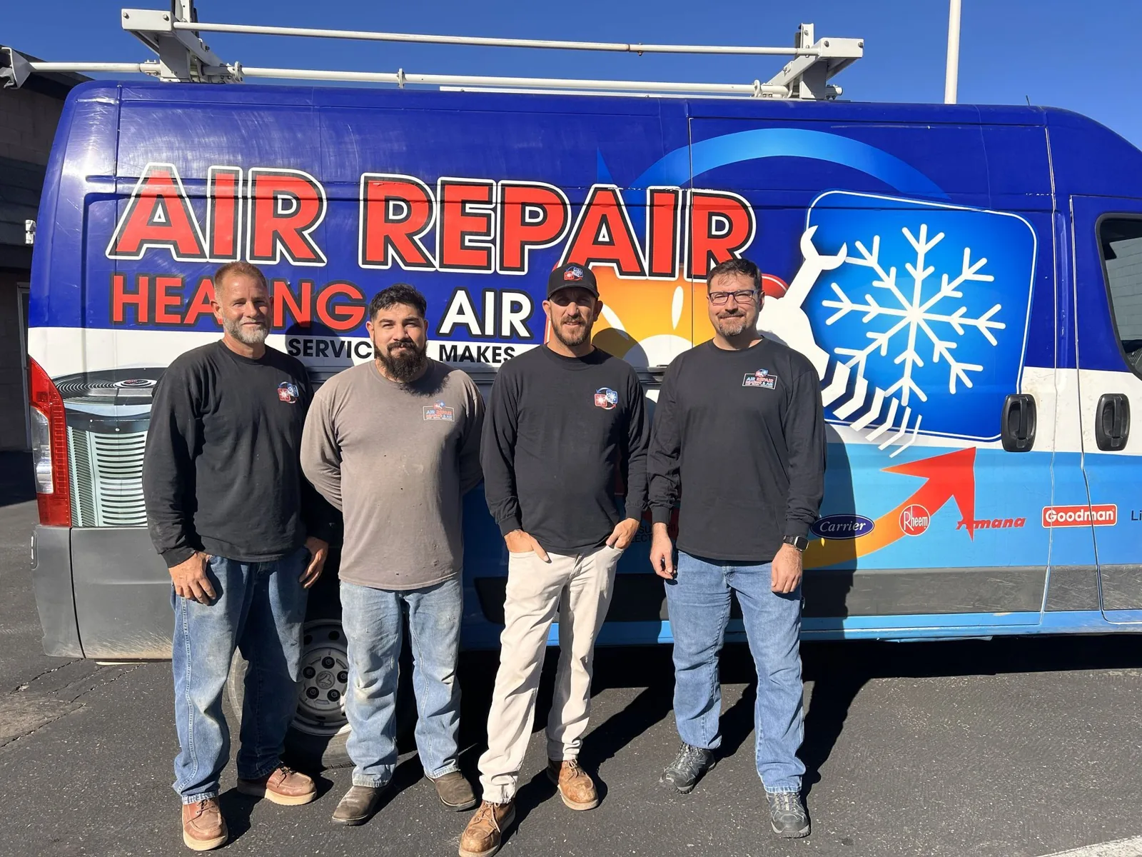 Air Repair HVAC team in front of a company van