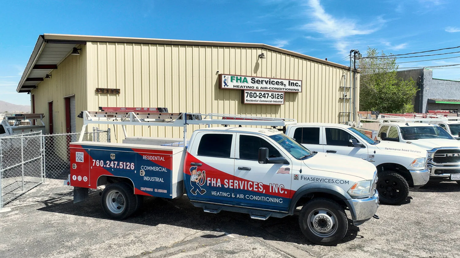 FHA Services trucks outside the company shop in Apple Valley